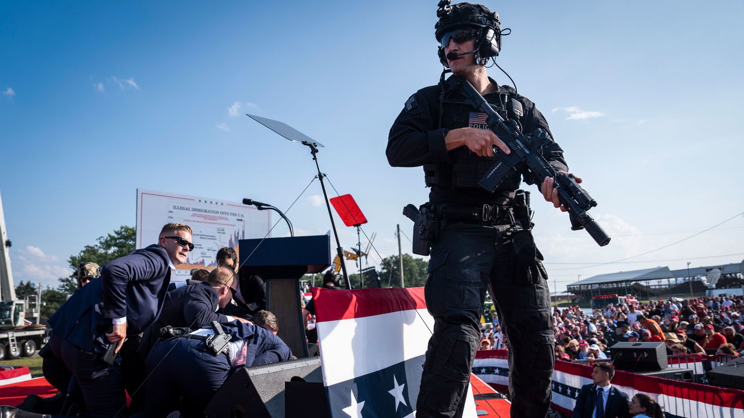 Secret Service agents and counter assault team react moments after shots were fired toward former president Donald Trump during a campaign rally in Butler, Pennsylvania, July 13, 2024.