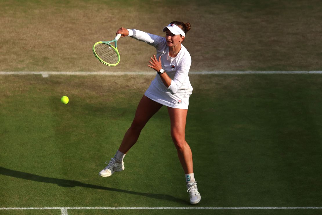 Krejcikova serves into the semifinals.