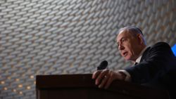 Israeli Prime Minister Benjamin Netanyahu speaks during a commemoration ceremony for soldiers killed during the 2014 Gaza war, also known as Operation Protective Edge, at the Memorial Hall on Mount Herzl in Jerusalem on July 16, 2024.