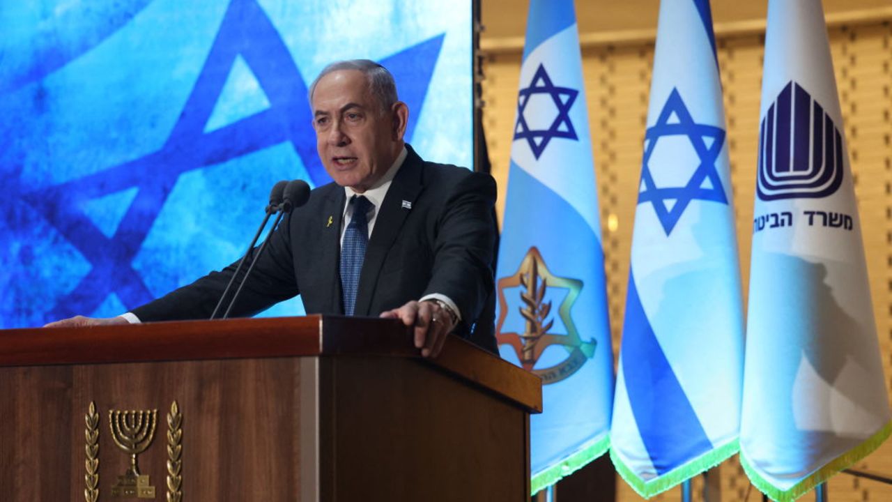 Israeli Prime Minister Benjamin Netanyahu speaks during a commemoration ceremony for soldiers killed during the 2014 Gaza war, also known as Operation Protective Edge, at the Memorial Hall on Mount Herzl in Jerusalem on July 16, 2024. (Photo by ABIR SULTAN / POOL / AFP) (Photo by ABIR SULTAN/POOL/AFP via Getty Images)