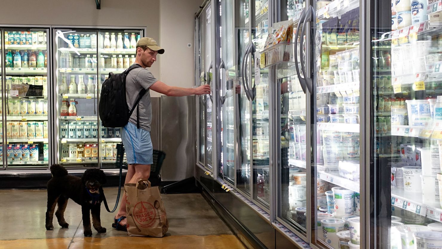 A customer shops for dairy products at a supermarket in Manhattan on July 11 in New York City.