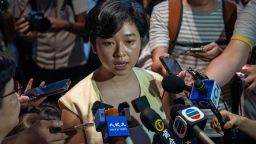 Hong Kong Journalist Association Chairwoman Selina Cheng is speaking to the media after leaving the Wall Street Journal's office in Hong Kong, on July 17, 2024.