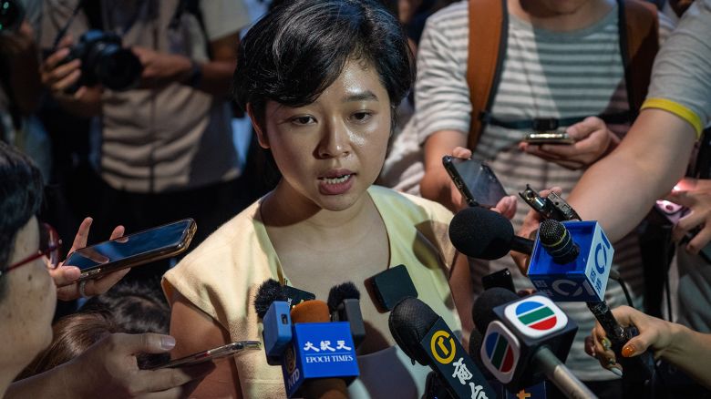 Hong Kong Journalist Association Chairwoman Selina Cheng is speaking to the media after leaving the Wall Street Journal's office in Hong Kong, on July 17, 2024.
