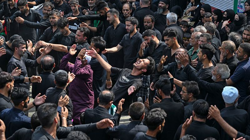 Shiite Muslims mark holy day of Ashura with mourning and self-flagellation