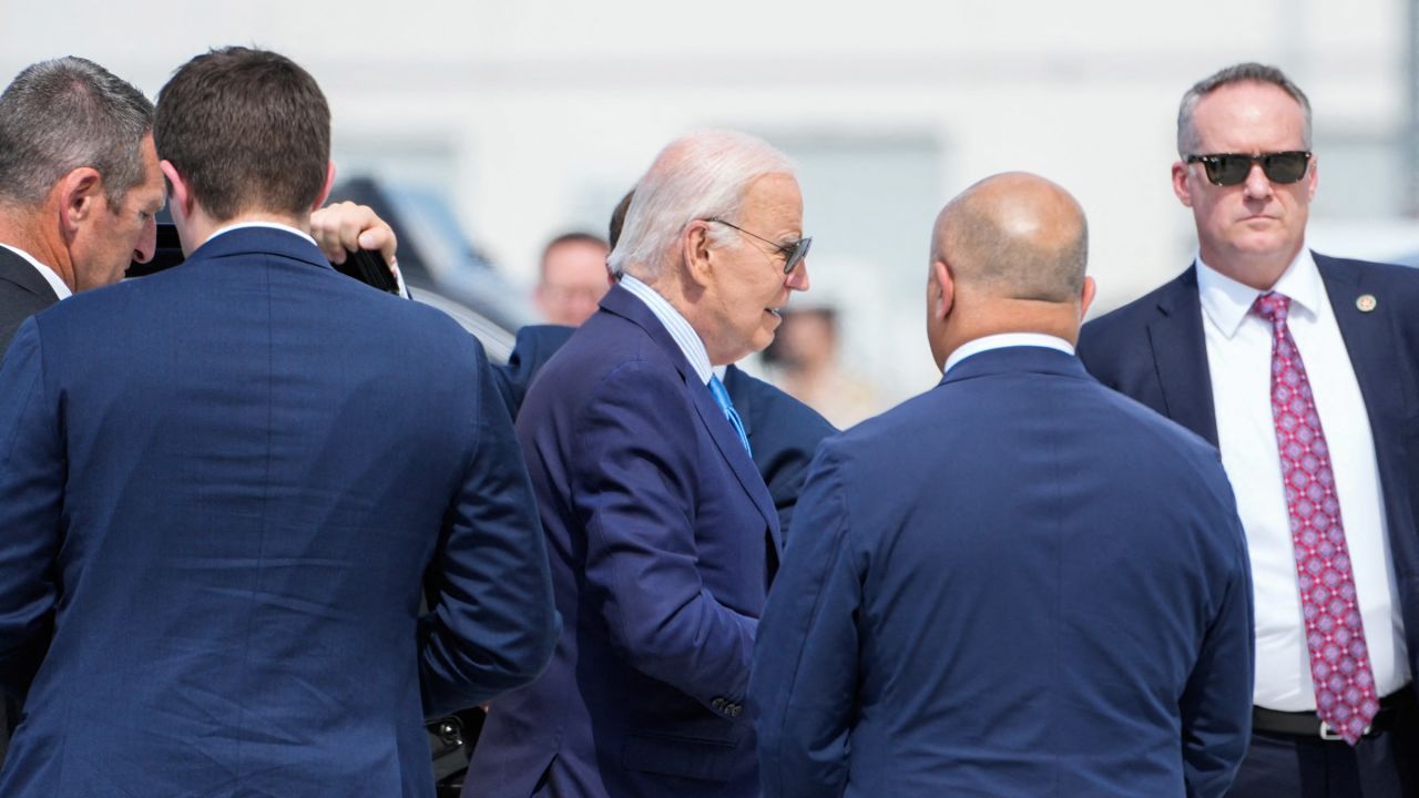 President Joe Biden exits his motorcade on his way to board Air Force One as he departs Harry Reid International Airport in Las Vegas, Nevada, on July 17, 2024, en route to Delaware.