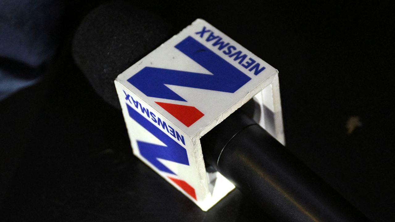 A Newsmax microphone is seen during the third day of the 2024 Republican National Convention at the Fiserv Forum in Milwaukee, Wisconsin, on July 17, 2024. Days after he survived an assassination attempt Donald Trump won formal nomination as the Republican presidential candidate and picked Ohio US Senator J.D. Vance for running mate. (Photo by Patrick T. Fallon / AFP) (Photo by PATRICK T. FALLON/AFP via Getty Images)