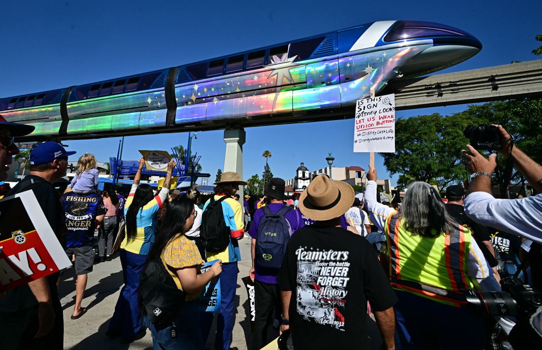 Disney employees rally outside the main entrance of Disneyland Resort in Anaheim, California, on July 17, 2024.