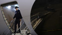 President Joe Biden gestures to reporters as he steps off Air Force One upon arrival at Dover Air Force Base in Dover, Delaware, on July 17, 2024. Biden tested positive for Covid with mild symptoms on July 17.