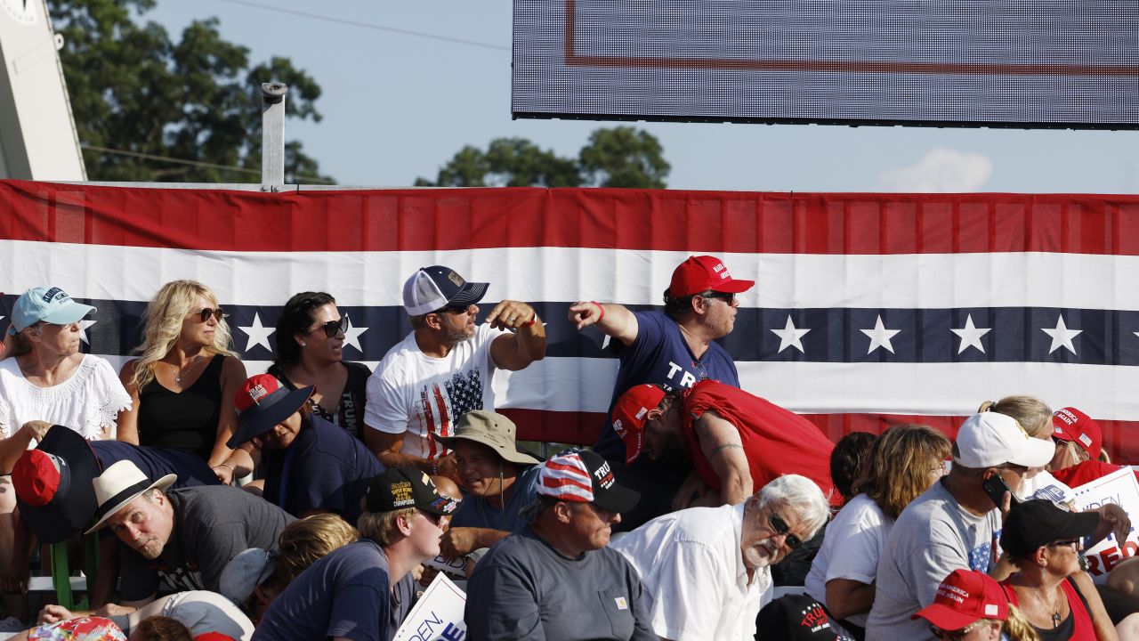 BUTLER, PENNSYLVANIA - JULY 13: The crowd reacts after shots were fired at Republican presidential candidate former President Donald Trump's rally on July 13, 2024 in Butler, Pennsylvania. Butler County district attorney Richard Goldinger said the shooter is dead after injuring former U.S. President Donald Trump, killing one audience member and injuring another in the shooting. (Photo by Anna Moneymaker/Getty Images)