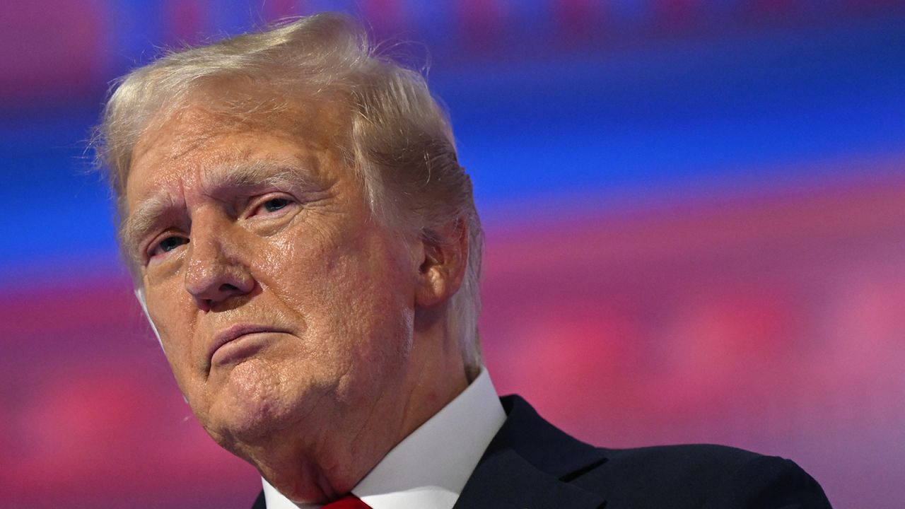 Former US President and 2024 Republican presidential candidate Donald Trump stands on stage after accepting his party's nomination on the last day of the 2024 Republican National Convention at the Fiserv Forum in Milwaukee, Wisconsin, on July 18, 2024.