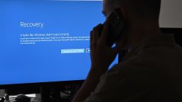 In this photo illustration the blue screen of death errors on computer screens are viewed due to the global communications outage caused by CrowdStrike, which provides cyber security services to US technology company Microsoft, on July 19, 2024 in Ankara, Turkiye.
