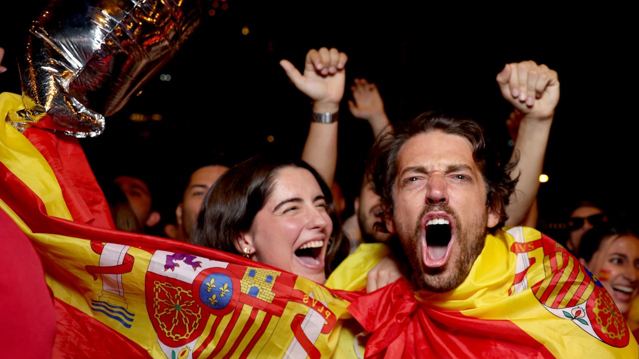 VARIOUS CITIES - JULY 14: Fans of Spain Celebrates the Spanish national team win the EURO 2024 Final as England face Spain in the men's UEFA Euro 2024 final at Plaza Colon on July 14, 2024 in Madrid, Spain. The match was held at the Olympiastadion in Berlin. (Photo by Florencia Tan Jun/Getty Images)