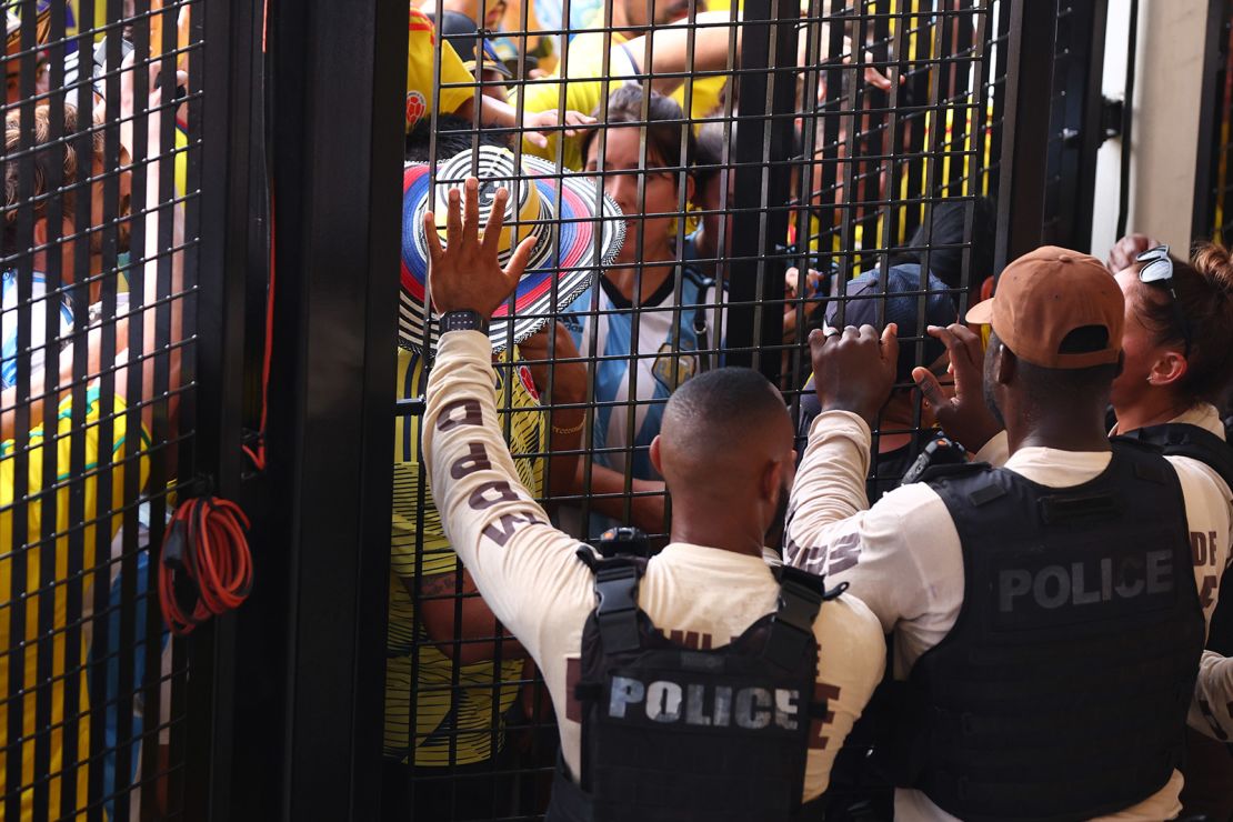 Fans try to enter the stadium amid disturbances prior to the CONMEBOL Copa America 2024 Final match between Argentina and Colombia at Hard Rock Stadium in Miami Gardens, Florida on July 14, 2024.