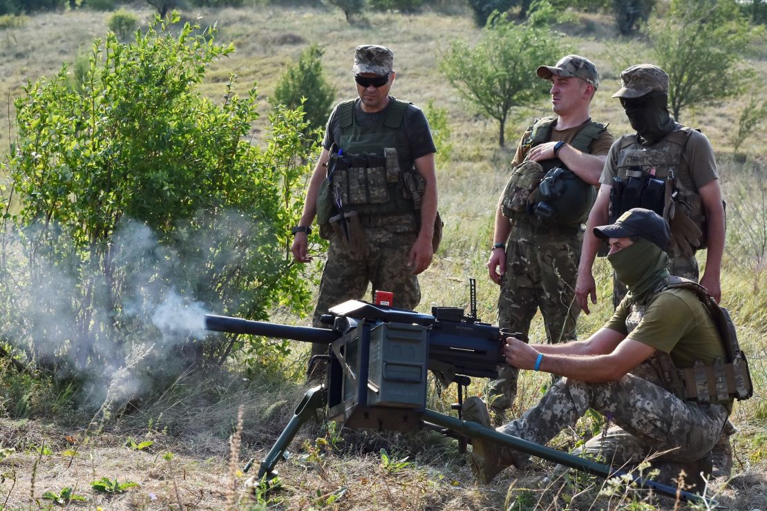 A Ukrainian serviceman of 141st Separate Infantry brigade fires a US-made Mark 19, 40mm automatic grenade-launcher near Zaporizhzhia.