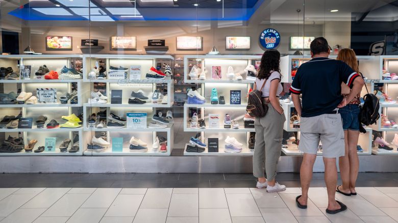 A family views shoes at a Sketchers retail store at the Barton Creek Square Mall on July 16, 2024 in Austin, Texas.