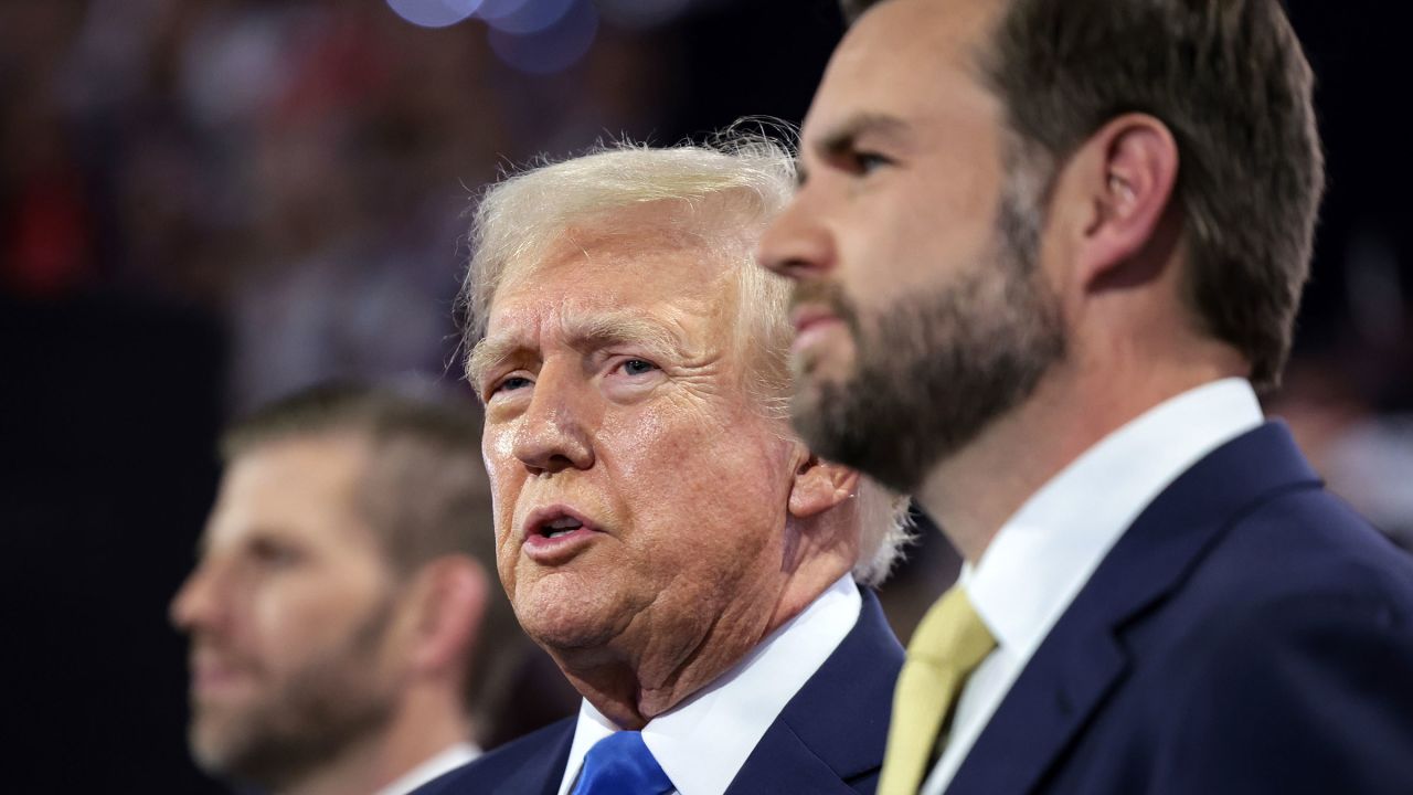 Former President Donald Trump and Sen. JD Vance look on during the second day of the Republican National Convention at the Fiserv Forum on July 16, 2024 in Milwaukee, Wisconsin.