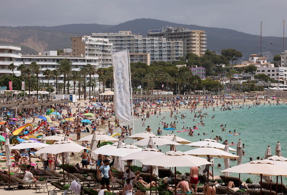 Locals have been protesting to reclaim space from visitor in the Spanish destinations of Mallorca and the Canary Islands. Here, tourists are seen on the beach in Magaluf, Mallorca.