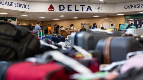 Luggage at the Delta baggage claim at Hartsfield-Jackson Atlanta International Airport (ATL) in Atlanta, Georgia, US, on Tuesday, July 23, 2024. Delta Air Lines Inc. is under investigation by US transportation authorities over its handling of a technology glitch that has led to thousands of canceled flights.