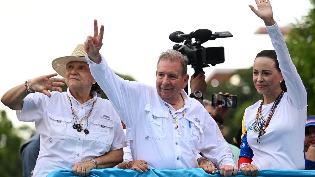 Venezuelan opposition presidential candidate Edmundo Gonzalez Urrutia, his wife Mercedes Lopez (L) and opposition leader Maria Corina Machado attend a campaign a rally in Maracaibo, Zulia state, Venezuela on July 23, 2024. Venezuela will hold presidential elections on July 28, 2024. (Photo by Raul ARBOLEDA / AFP) (Photo by RAUL ARBOLEDA/AFP via Getty Images)