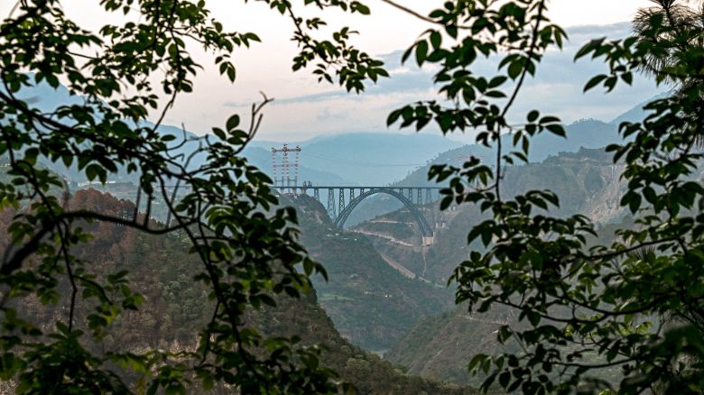 This photograph taken on July 6, 2024, shows a general view of Chenab bridge, the world's highest rail arch bridge in Reasi, Jammu and Kashmir.