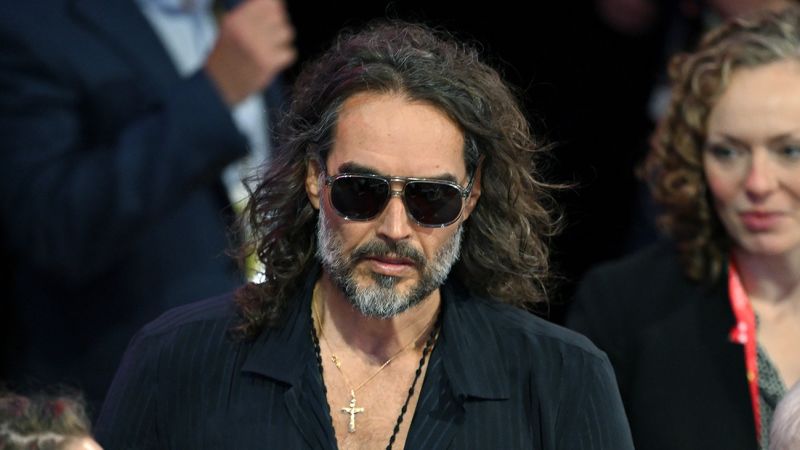 Russell Brand arrives at London court to face sexual assault charges