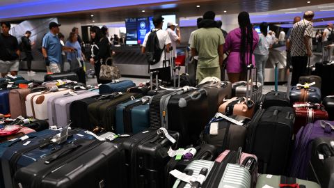 Bags await reunification with their owners in the Delta Air Lines baggage claim area Los Angeles International Airport (LAX) on July 24, 2024 in Los Angeles, California. The United States Department of Transportation (USDOT) announced an investigation into Delta Air Lines to comply with passenger protection laws following the CrowdStrike global software outage that disrupted airlines, banks, TV channels and other businesses worldwide.CrowdStrike, the cybersecurity company that caused a global computer outage last week, on on July 24, 2024 said that the breakdown stemmed from a flaw in its test software. In an incident report, the company said the glitch was pushed out to millions of Windows computers and that the company will change the way it handles such updates in the future.