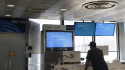 CHICAGO, ILLINOIS - JULY 19: Flight information screens display a recovery window in the second terminal at Chicago O'Hare International Airport on July 19, 2024 in Chicago, Illinois. Businesses including airlines worldwide were affected by a global technology outage that was attributed to a software update issued by CrowdStrike, a cybersecurity firm whose software is used by many industries around the world. (Photo by Anna Moneymaker/Getty Images)