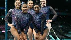 TOPSHOT - (From L to R) US' Hezly Rivera, Jordan Chiles, Sunisa Lee, Simone Biles and Jade Carey pose for a photo during an artistic gymnastics training session at the Bercy Arena in Paris on July 25, 2024, ahead of the Paris 2024 Olympic Games. (Photo by Loic VENANCE / AFP) (Photo by LOIC VENANCE/AFP via Getty Images)