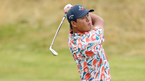 Si Woo Kim of South Korea plays his second shot on the 11th hole during day three of The 152nd Open championship at Royal Troon on July 20, 2024 in Troon, Scotland.