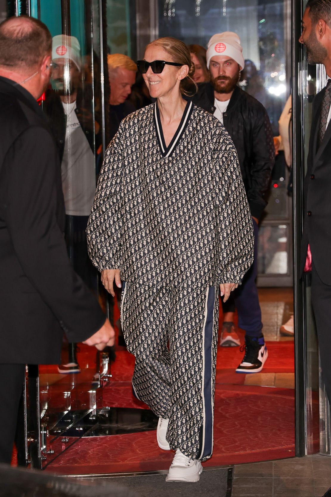 Opening ceremony performer Celine Dion arrived in Paris on July 25 wearing a matching Dior tracksuit.