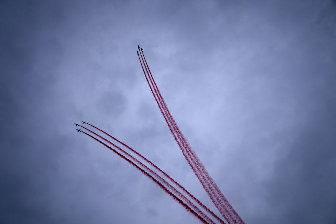 Planes perform over the Seine River during the ceremony. A shape of a heart was made in the sky.