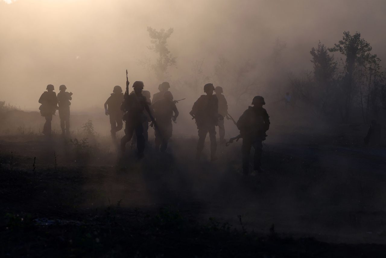 Ukrainian servicemen take part in military exercises at an unspecified location in the Donetsk region on July 26, amid the Russian invasion of Ukraine.