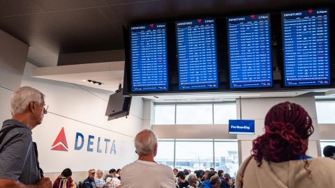 Travelers wait to board their delayed flight at the Hartsfield-Jackson Atlanta International Airport on July 23, 2024 in Atlanta, Georgia. Delta Airlines has canceled and delayed hundreds of additional flights as problems from the outage caused by the Crowdstrike software update continue into a fifth day.