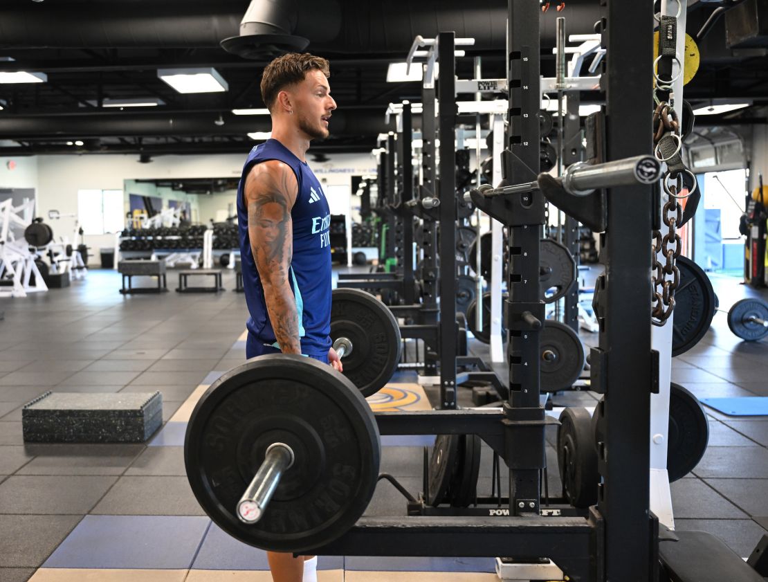Incorporating weight training into your daily routine can help maintain strength. Here, Arsenal soccer star Ben White works out at the Los Angeles Rams facility on July 23 in Thousand Oaks, California.