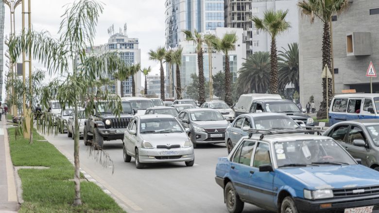Cars drive past by the newly planted trees and light installations in Addis Ababa, Ethiopia, on July 27, 2024. Addis Ababa's urban renewal brings modern infrastructure and new challenges, with steep fines for traffic violations and new regulations. (Photo by Amanuel Sileshi / AFP) (Photo by AMANUEL SILESHI/AFP via Getty Images)