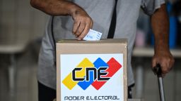 A man casts his vote during the Venezuelan presidential election, in Caracas on July 28, 2024.