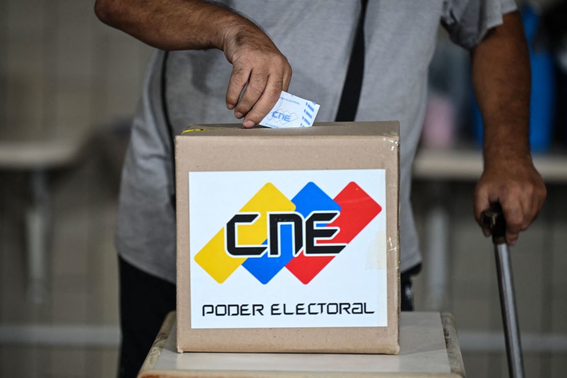 A voter casts their ballot during the Venezuelan presidential election in Caracas on July 28, 2024.