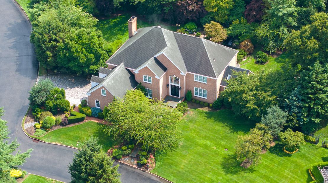 An aerial view of the Saxony Court, home in Manhasset, New York belonging to Chris Hu and Linda Sun, July 24, 2024. The FBI searched the home on July 23, 2024.