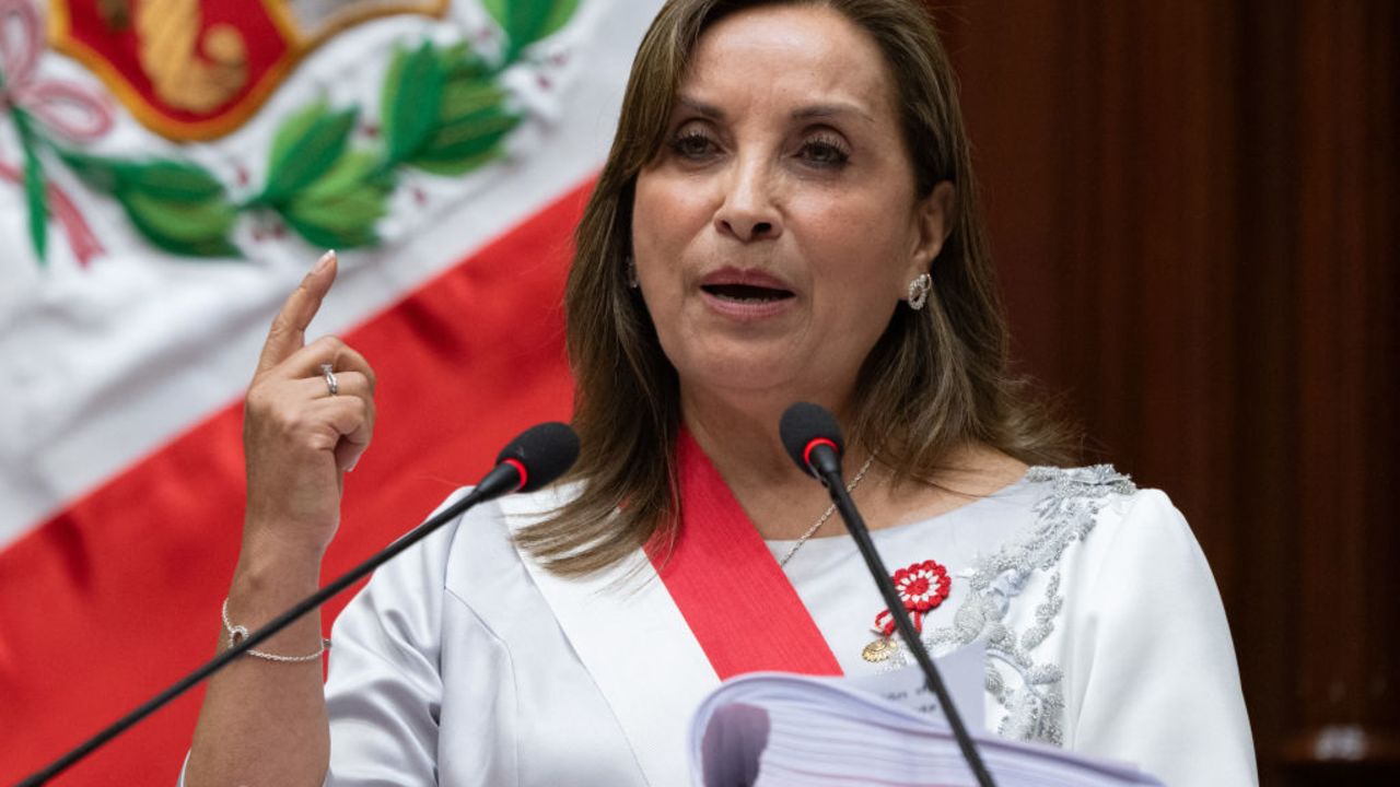 Peruvian President Dina Boluarte delivers her address to the nation on Independence Day at the National Congress in Lima on July 28, 2024. Peruvian President Dina Boluarte, under investigation by prosecutors for luxury watches she did not declare as part of her assets, said in a message to the nation that neither she nor her government is corrupt, although she avoided referring to the so-called Rolexgate affair. Boluarte spoke from Congress amid protests by dozens of demonstrators who marched against her government outside the legislature. (Photo by Cris BOURONCLE / POOL / AFP) (Photo by CRIS BOURONCLE/POOL/AFP via Getty Images)