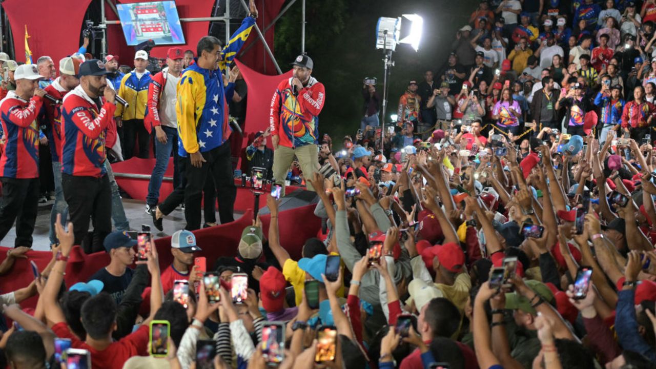 Venezuelan President and presidential candidate Nicolas Maduro reacts in front of his supporters following the presidential election results in Caracas on July 29, 2024. Venezuela's President Nicolas Maduro won reelection with 51.2 percent of votes cast Sunday, the electoral council announced, after a campaign tainted by claims of opposition intimidation and fears of fraud. (Photo by YURI CORTEZ / AFP) (Photo by YURI CORTEZ/AFP via Getty Images)