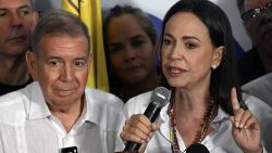 Venezuelan opposition leader Maria Corina Machado talks to the media next to opposition presidential candidate Edmundo Gonzalez Urrutia, following the presidential election results in Caracas on July 29, 2024. Venezuela's opposition coalition on Monday rejected the election victory claimed by President Nicolas Maduro and announced by a loyalist electoral authority, saying it had garnered 70 percent of the vote, not 44 percent as reported by the authority. (Photo by Federico PARRA / AFP) (Photo by FEDERICO PARRA/AFP via Getty Images)