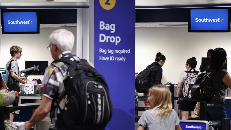 Southwest Airlines reveals how much it will cost to check a bag | CNN