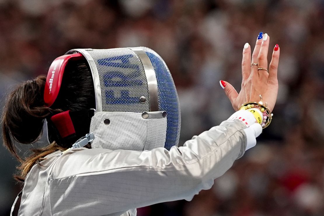 France's Sara Balzer competed her fencing match on July 29 with Olympics-themed nails.