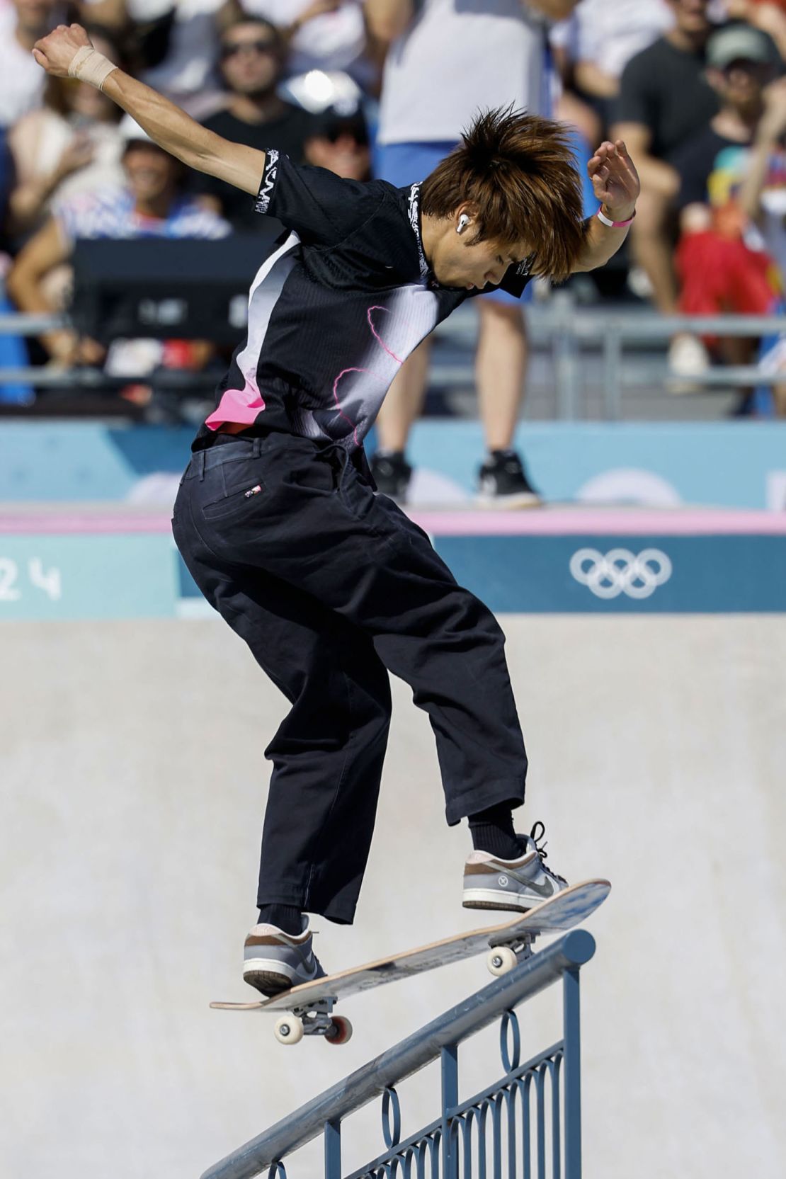 Japan's Yuto Horigome won gold in the men's street skateboarding final on July 29, wearing Apple AirPods and the Nike SB Dunk Low sneakers he collaborated on.