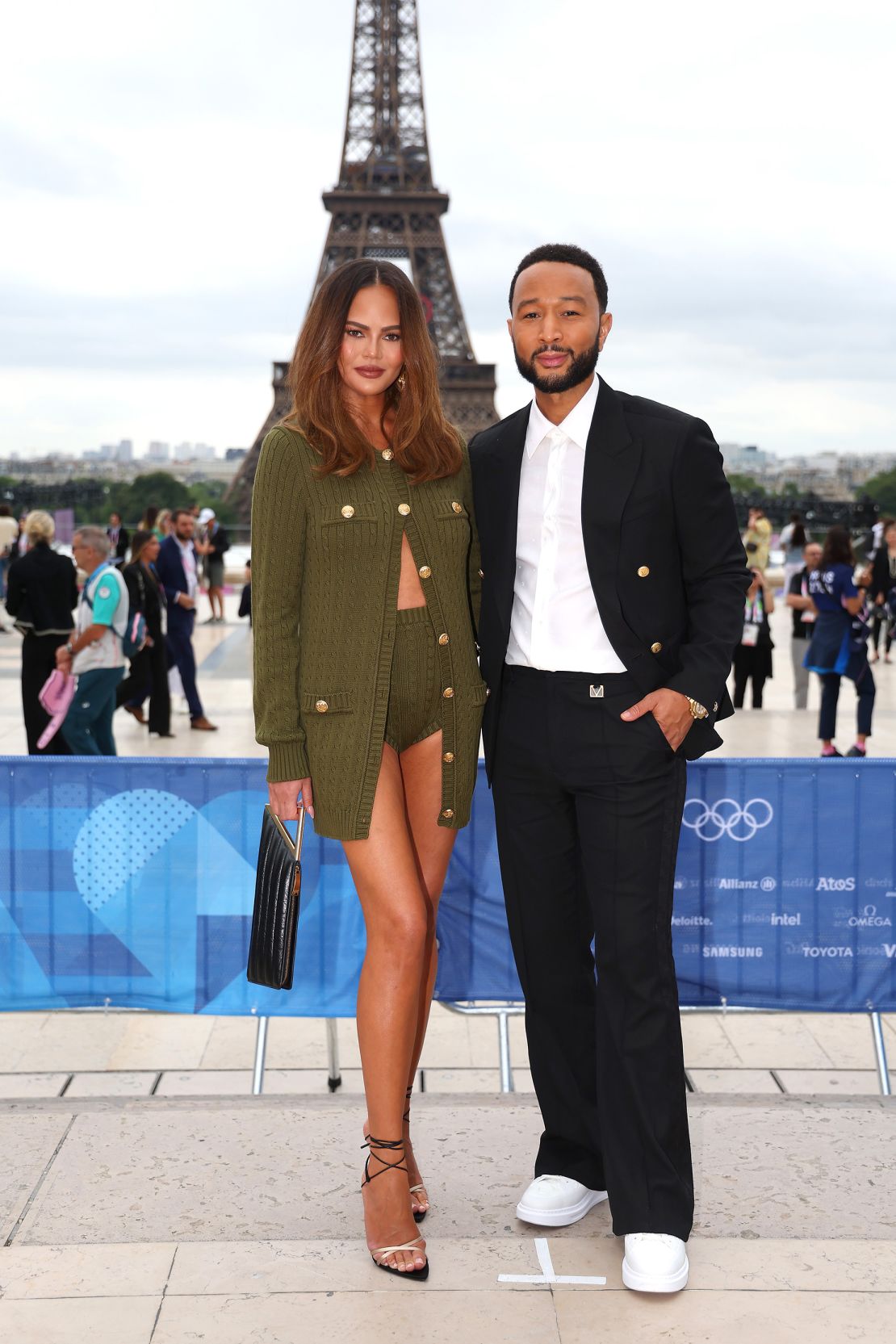 Chrissy Teigen, in Chloé, and John Legend, wearing Louis Vuitton, attended the red carpet ahead of the opening ceremony on July 26.