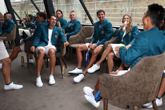 Australian athletes hang out on their boat together during the opening ceremony.