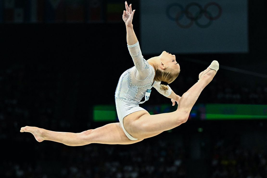 Italy's Alice D'amato competes in the balance beam event of the artistic gymnastics women's team final during the Paris 2024 Olympic Games at the Bercy Arena in Paris, on July 30, 2024. (Photo by Gabriel BOUYS / AFP) (Photo by GABRIEL BOUYS/AFP via Getty Images)