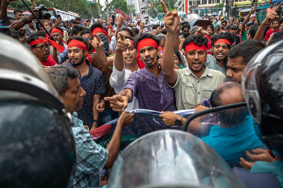 Cultural activists and members of civil society clashing with police at a march for victims killed during the recent nationwide student protests, in Dhaka, Bangladesh, on July 30, 2024.