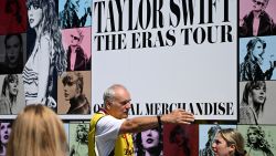 A steward guides fans of US singer Taylor Swift, also known as Swifties, as they arrive to buy merchandise outside the National Stadium in Warsaw on July 31, 2024, a day before the first of three shows of the pop star's Eras Tour. (Photo by Sergei GAPON / AFP) (Photo by SERGEI GAPON/AFP via Getty Images)