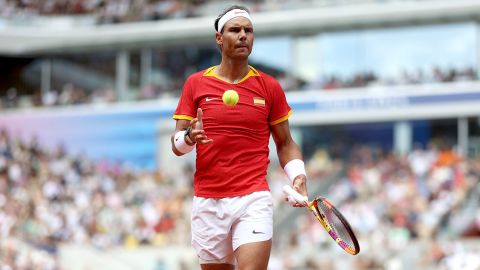 PARIS, FRANCE - JULY 28: Rafael Nadal of Team Spain looks on against Marton Fucsovics of Team Hungary during the Men’s Singles first round match on day two of the Olympic Games Paris 2024 at Roland Garros on July 28, 2024 in Paris, France. (Photo by Clive Brunskill/Getty Images)